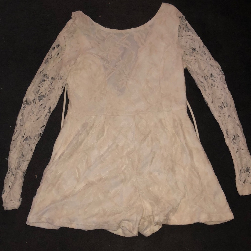 Cream long sleeved romper